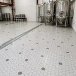 Durable drainage and industrial ceramic tiling solution for British brewery