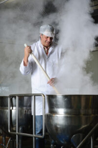Guystirringpan9 Switch from oil to liquid gas serves up big savings for Tracklements