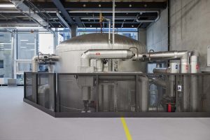 Stratified storage for improved capture of waste heat Energy monitoring cuts consumption and emissions